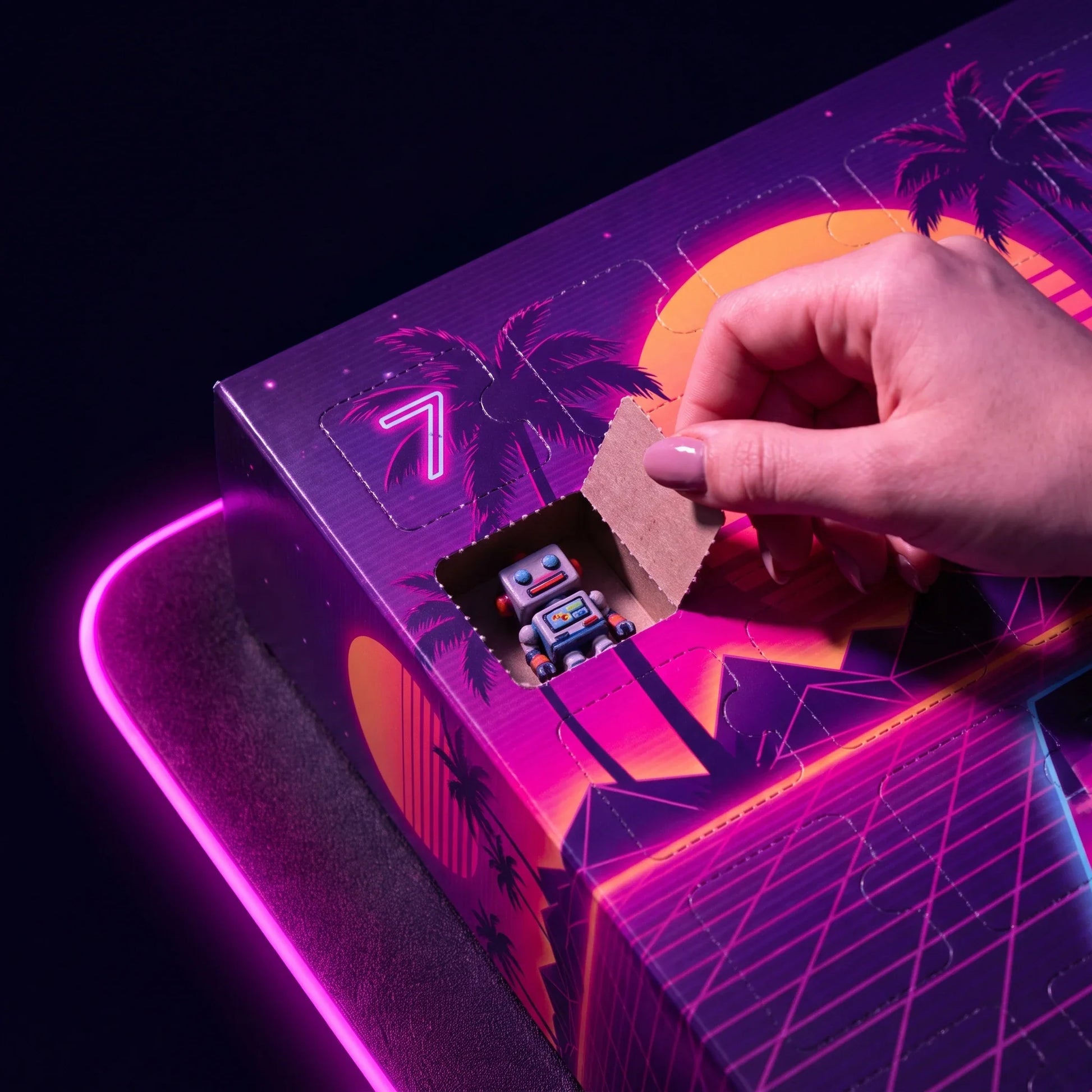 Hand opening door number 7 of the Vice Finds advent calendar