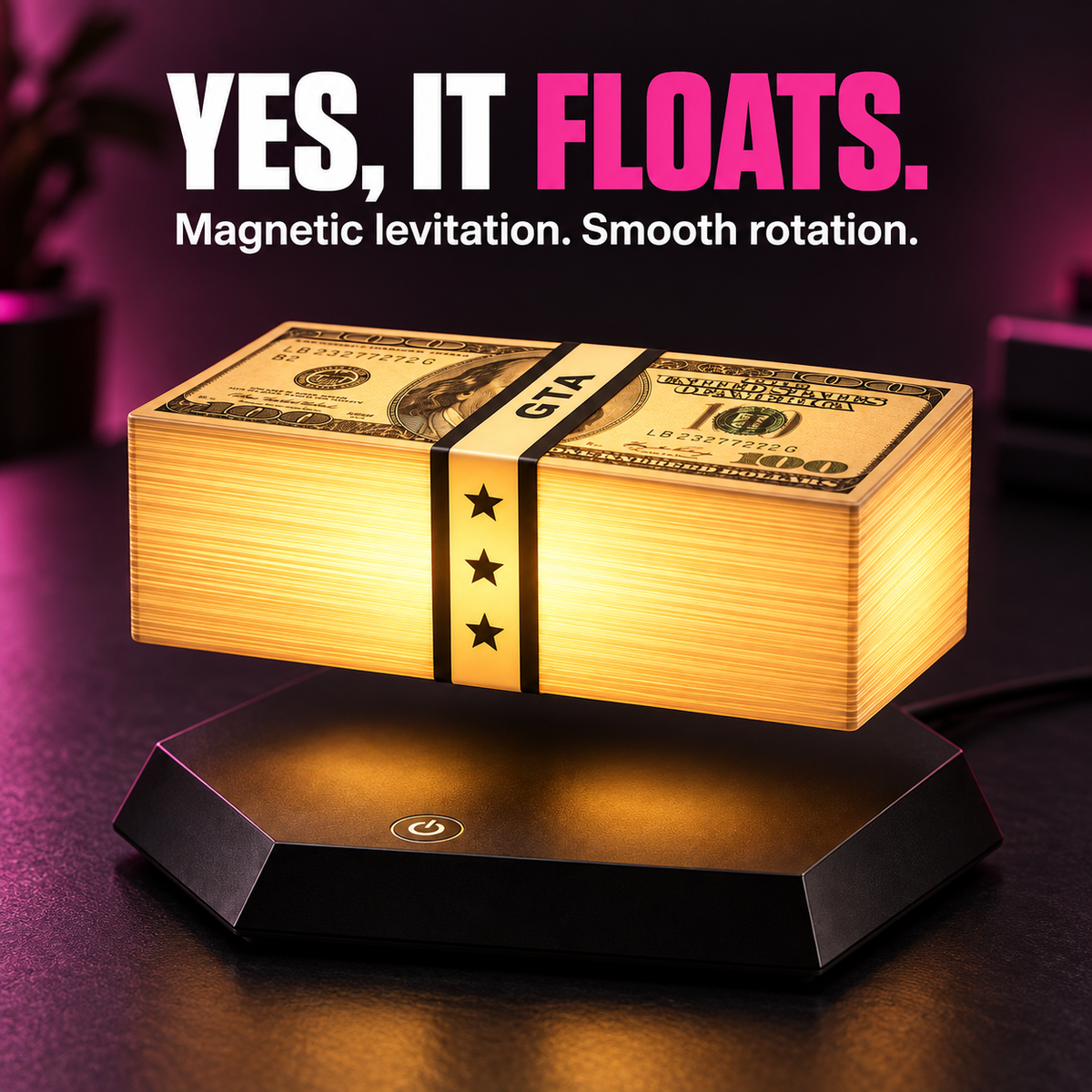 Close-up of the illuminated Vice Money banknote stack floating above its black base, showing the magnetic levitation gap.