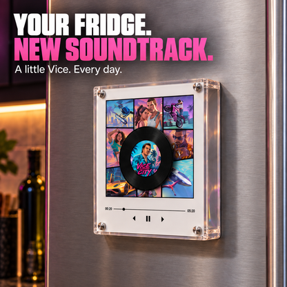 Close view of Vice Radio on a stainless steel fridge, showing the clear acrylic enclosure and Vice City mini disc.