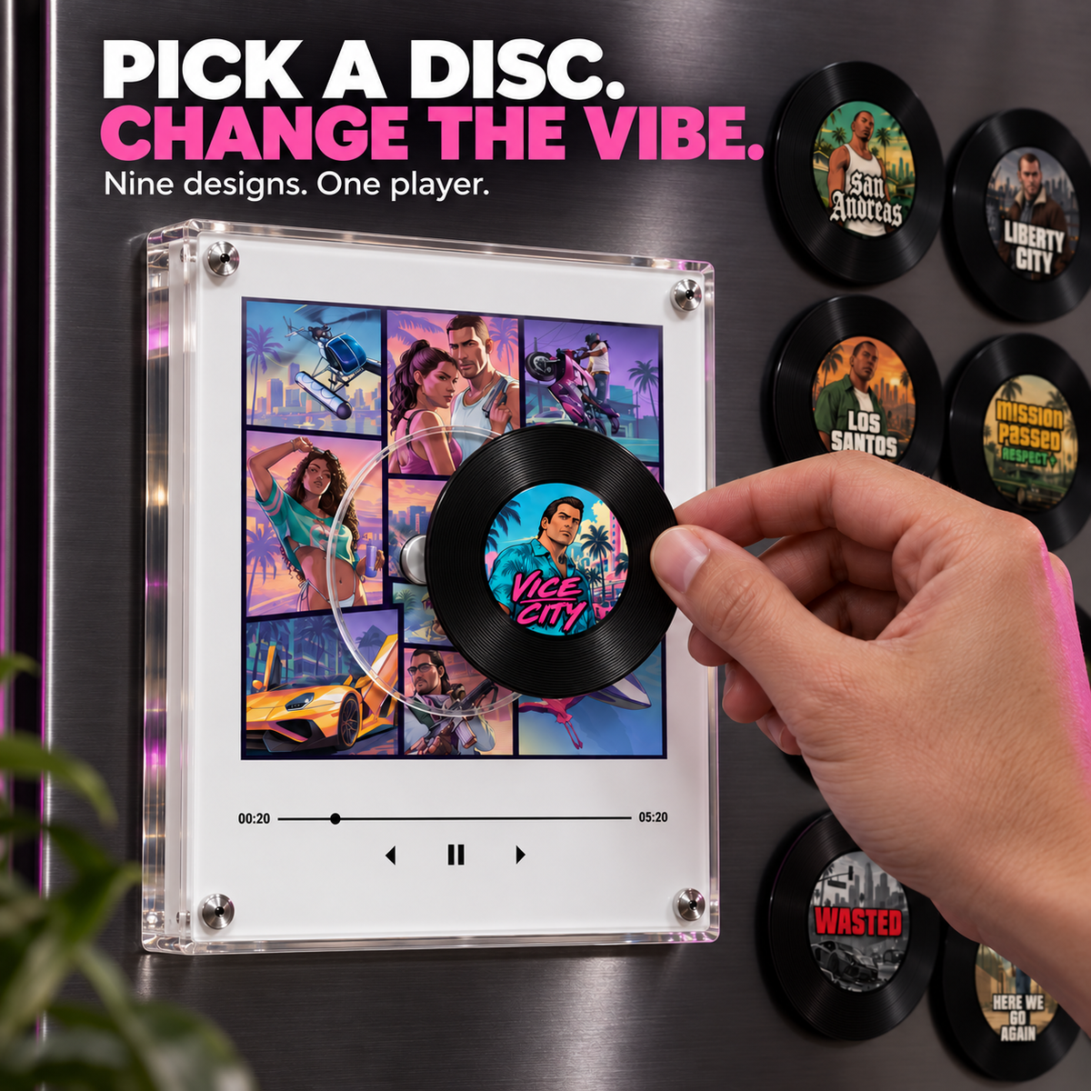 A hand placing the Vice City mini disc on Vice Radio, with the transparent acrylic enclosure visible in profile.